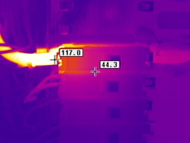 Thermal Imaging Services | Thermal camera records a temperature of 117°C with the cover plate removed